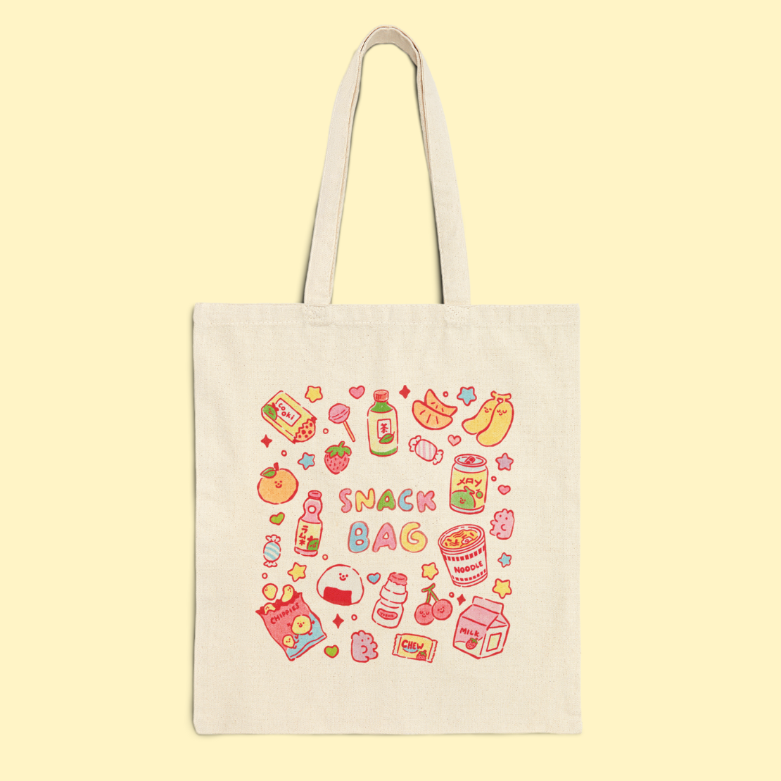 Tote bag with colorful snack illustrations on a light yellow background